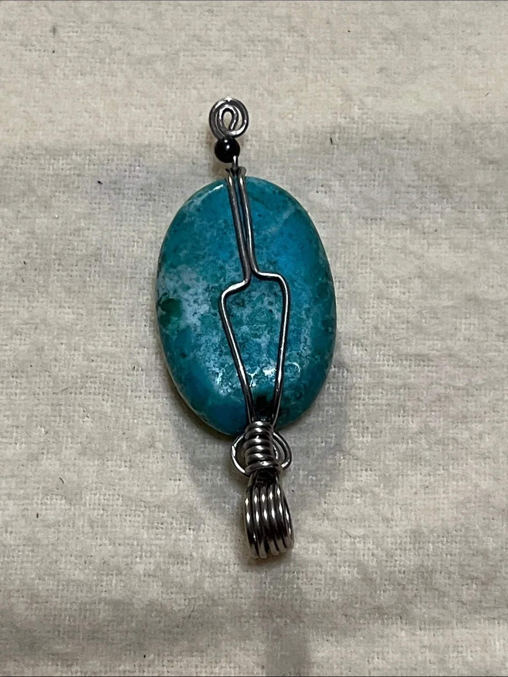 Turquoise Blue Oval Stone Pendant Necklace with Silver Spiral Accents